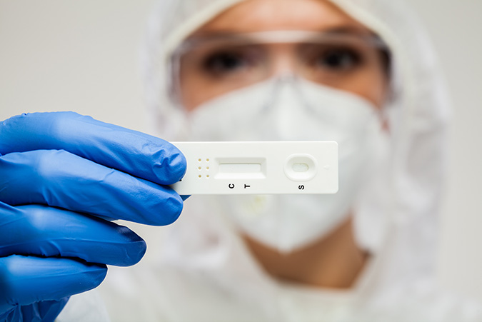 Scientist holding lateral flow test